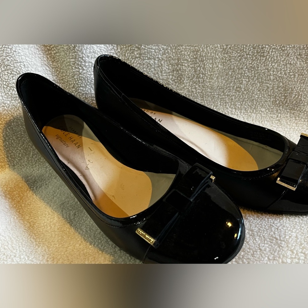 New Cole Haan black patent loafer style shoes. Size 6